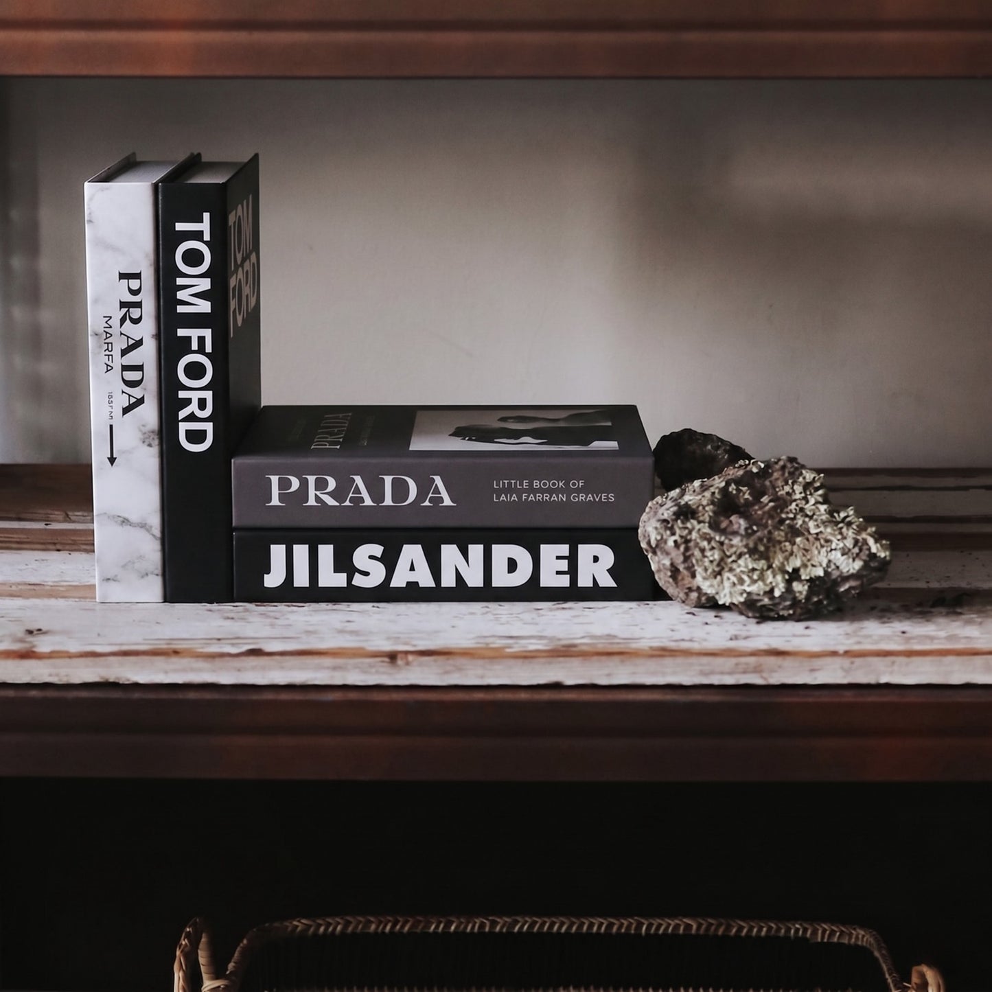 Glam books styled with dark fashion books
